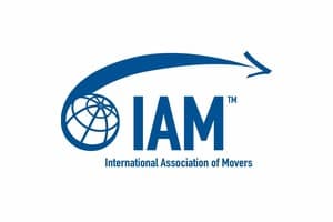 International Association of Movers logo with IAM text, a globe, and a swooping blue arrow.